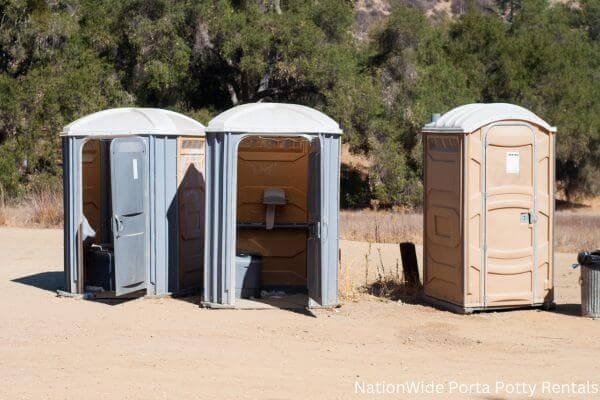 a clean row of portable restrooms for outdoor weddings or festivals in Orford, NH